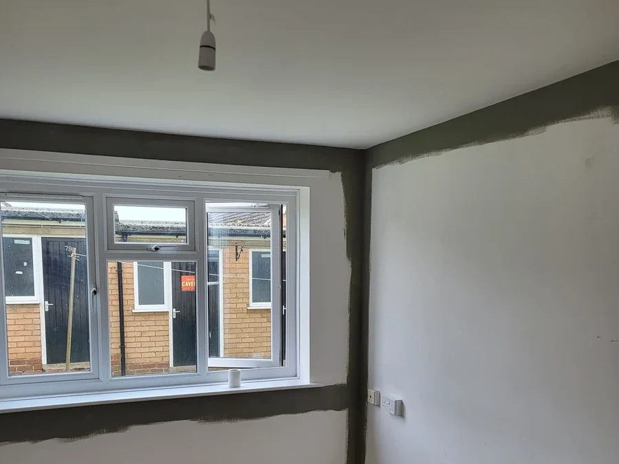 Bay-windowed Coventry room prepared for decorating