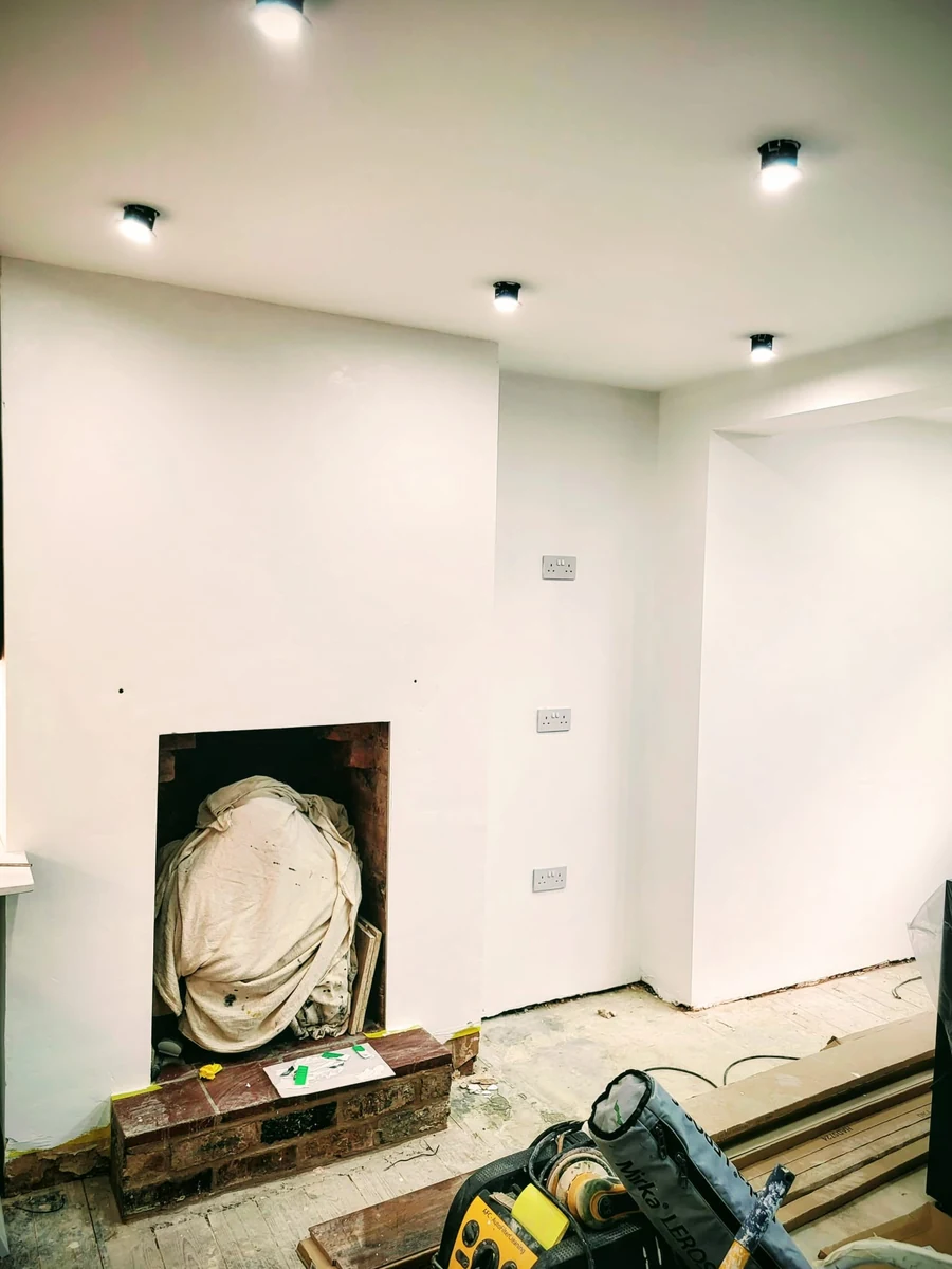 dark-fireplace-feature-coventry-godiva-decorators Dark painted fireplace feature wall in a Coventry period property