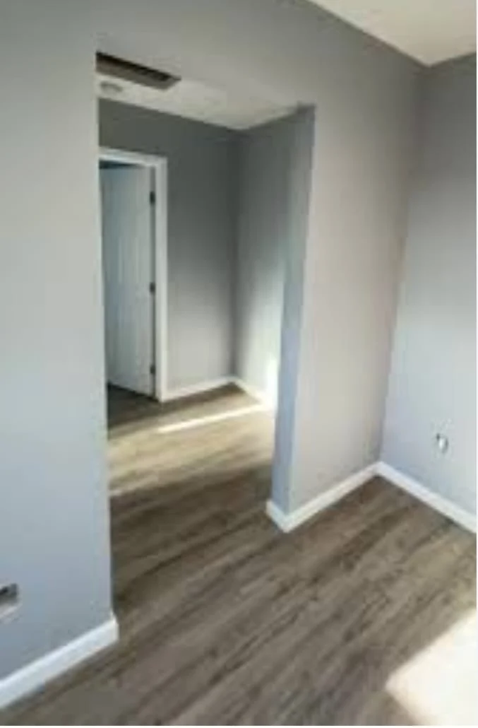 Freshly decorated empty reception room in Coventry by Godiva Decorators (completed)