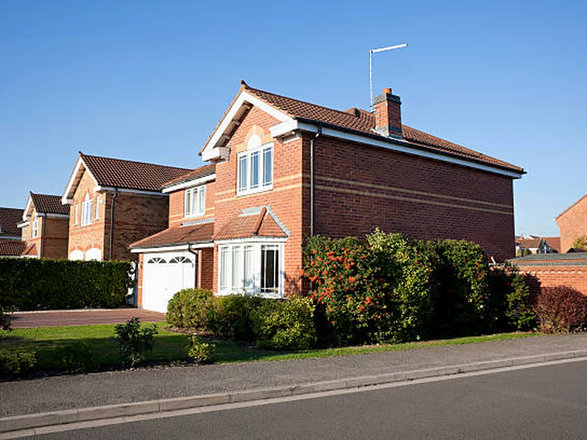 exterior-painting-red-brick-detached-godiva-decorators Red brick detached house with front door painting in Coventry