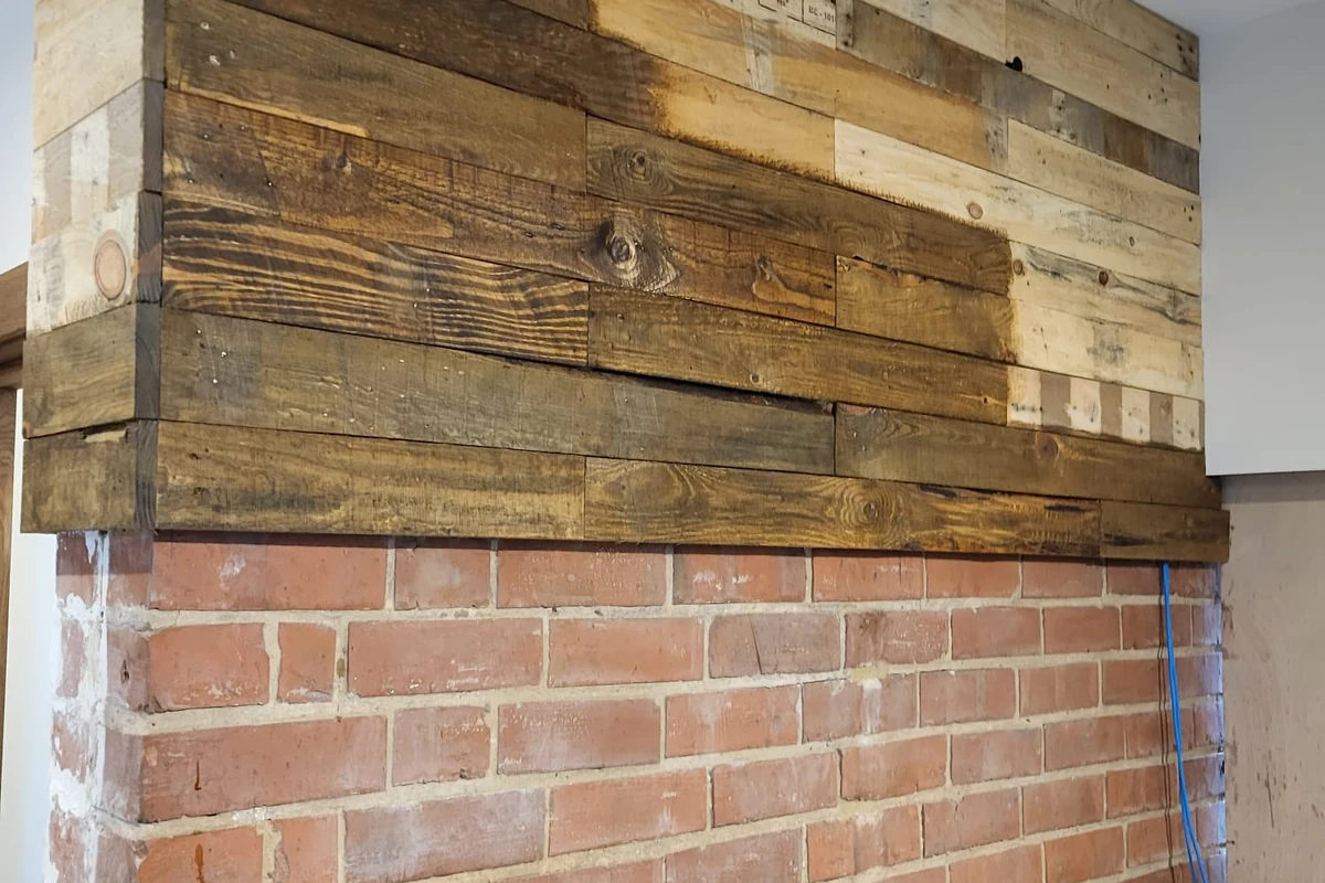 Timber-clad feature wall by Godiva Decorators in Coventry