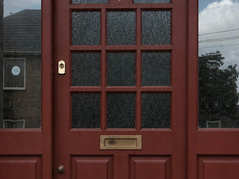 Front door restored and repainted in burgundy by Godiva Decorators, Coventry