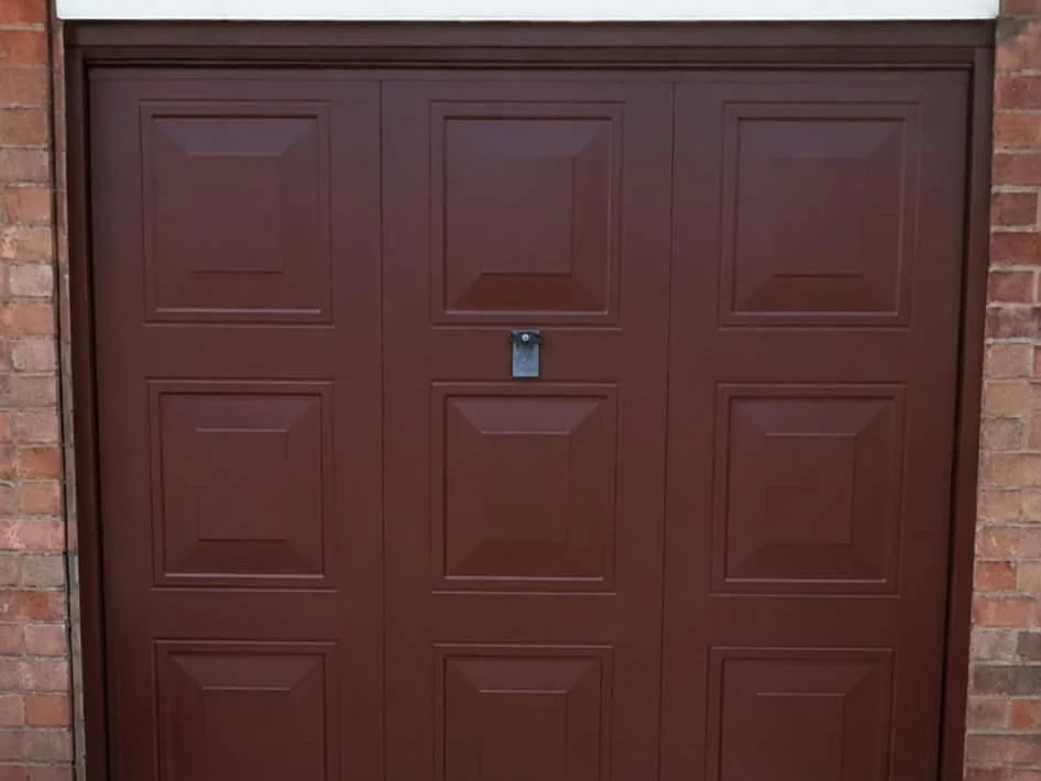 Garage door repainted in brown by Godiva Decorators, Coventry
