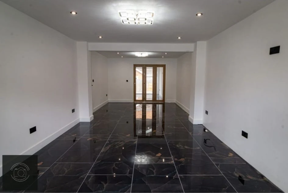 glazed-door-hallway-coventry-godiva-decorators Decorated hallway with a glazed door and dark floor in Coventry by Godiva Decorators (completed)