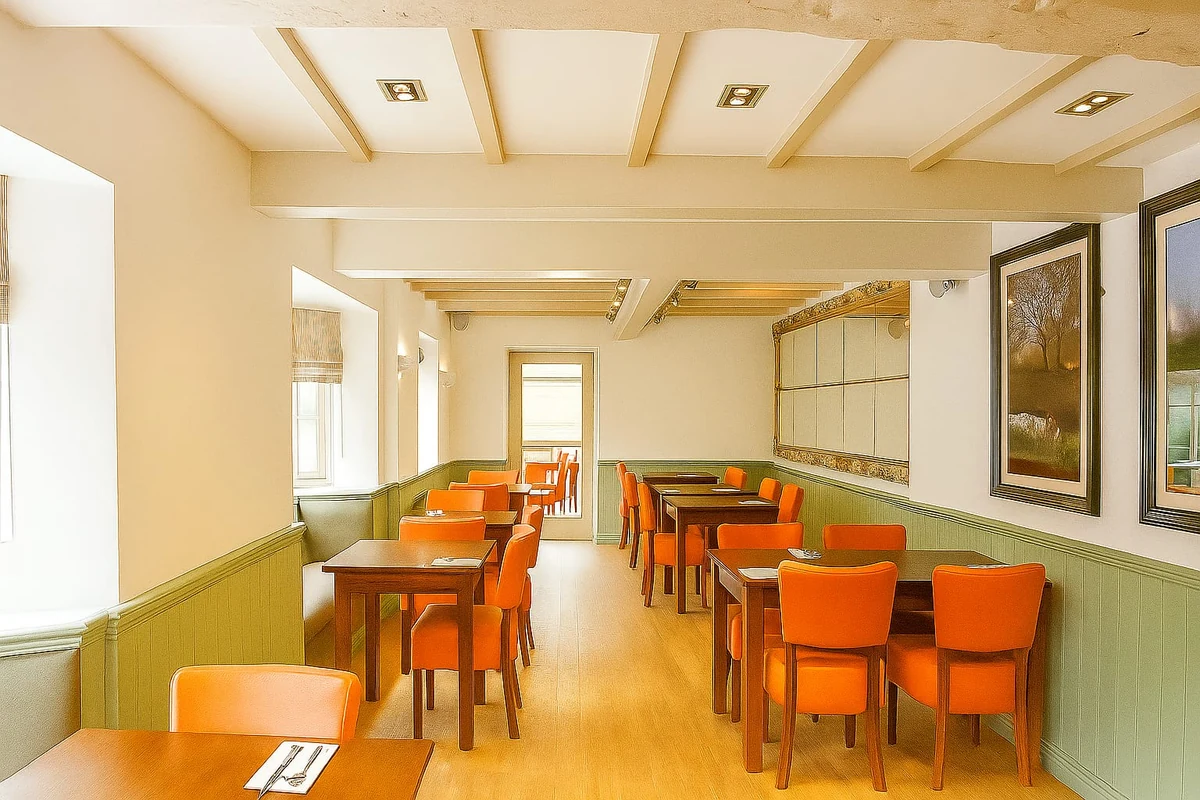 Decorated dining room with green walls, painted panelling and seating in Coventry by Godiva Decorators (completed)