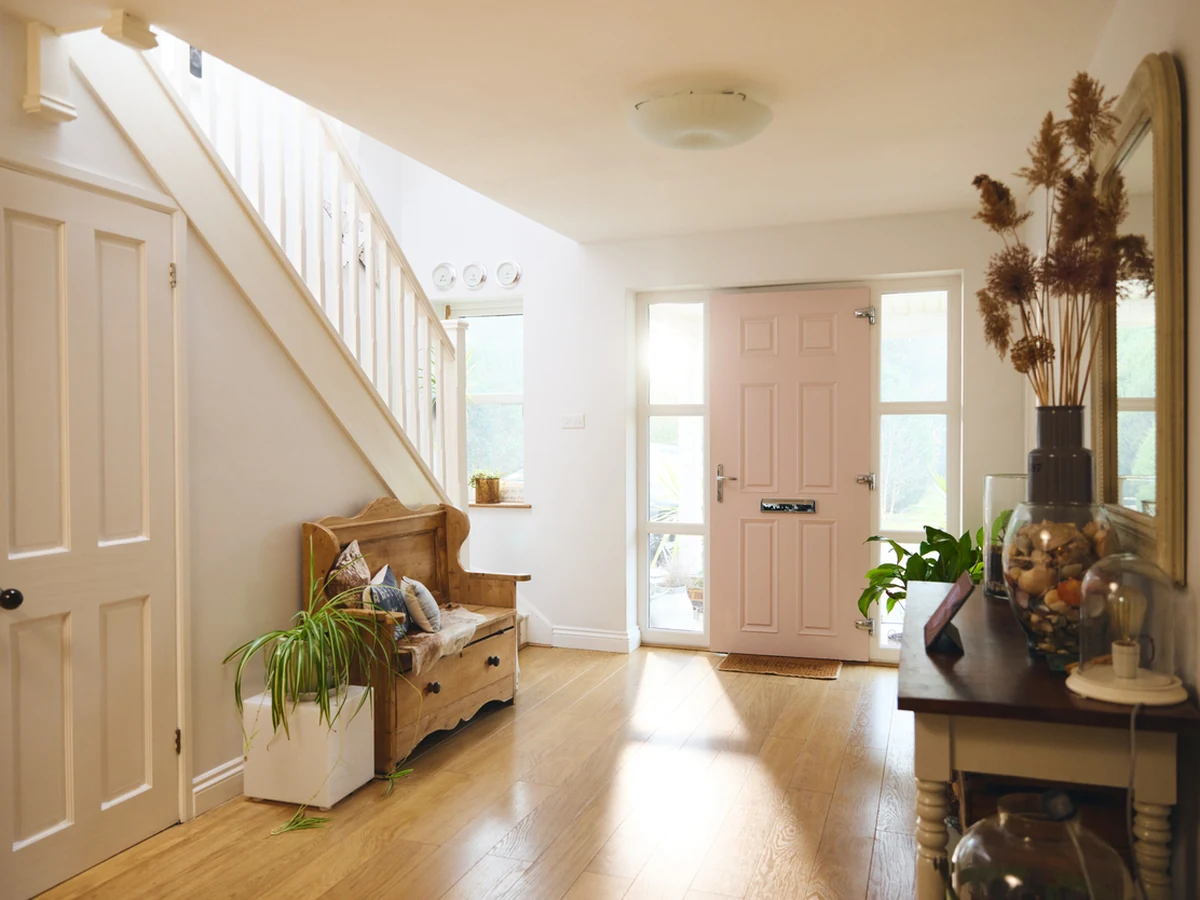Bright pale hallway painting in a Coventry property