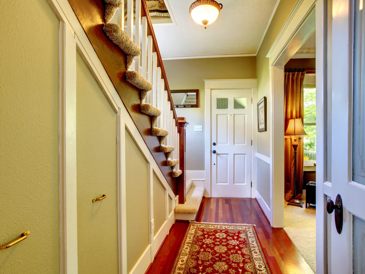 Classic hallway with painted doors and staircase in Coventry
