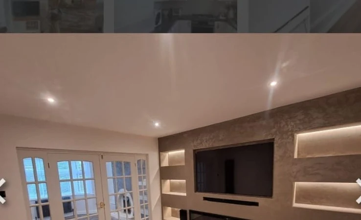 herringbone-media-room-coventry-godiva-decorators Media wall room with a herringbone floor and LED recesses in Coventry by Godiva Decorators (completed)