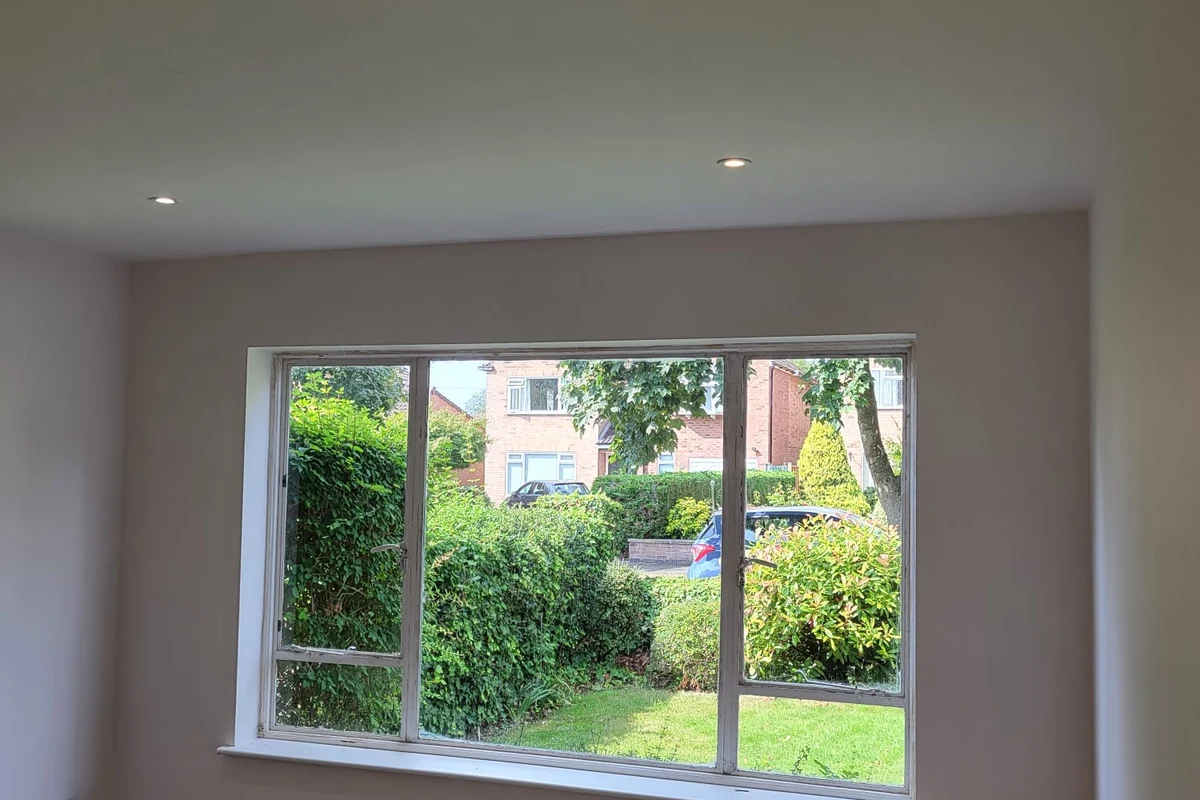 Freshly painted home interior with a garden view in Coventry by Godiva Decorators