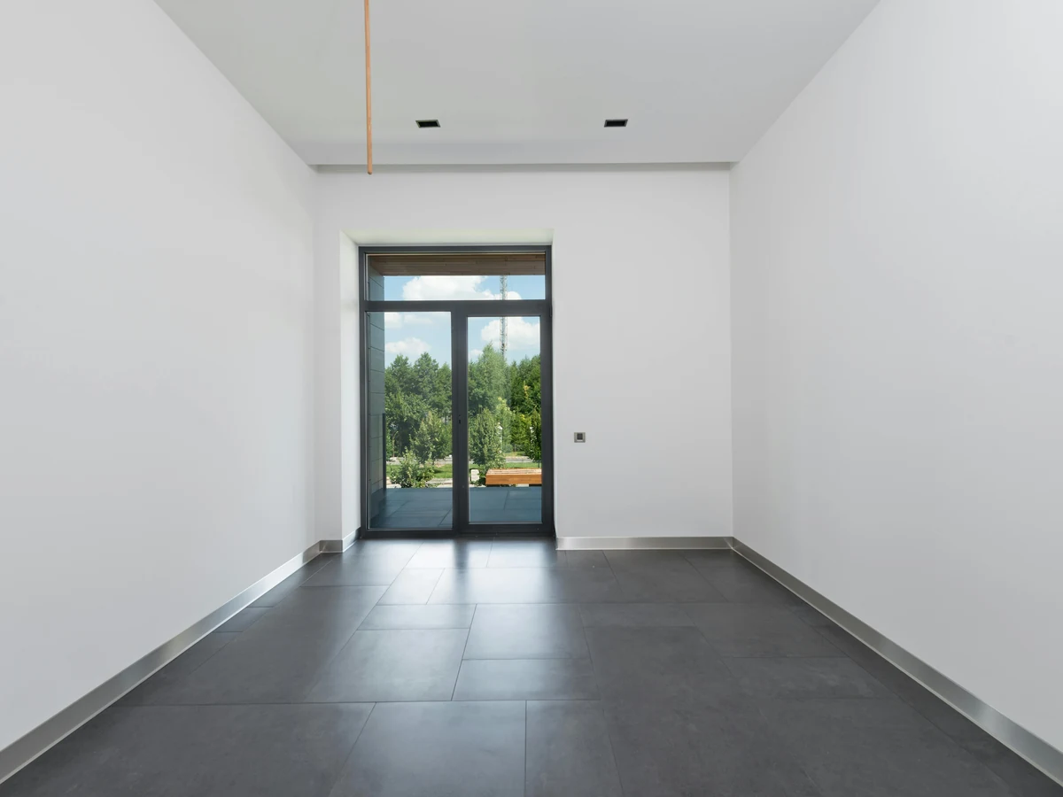 Empty white room with fresh interior paint by Godiva Decorators