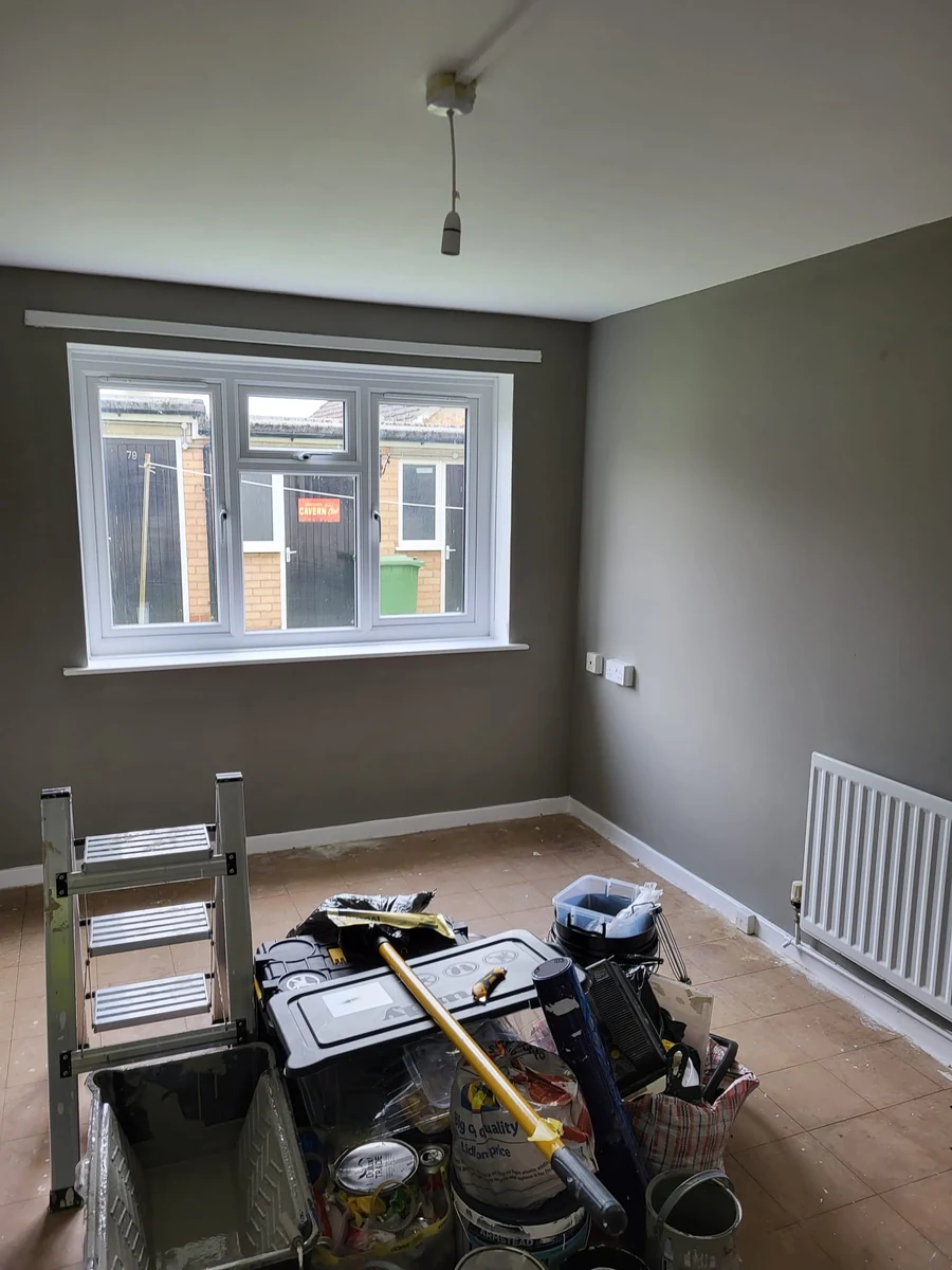 Decorating in progress with ladder and paint kettles on site in Coventry by Godiva Decorators (in progress)