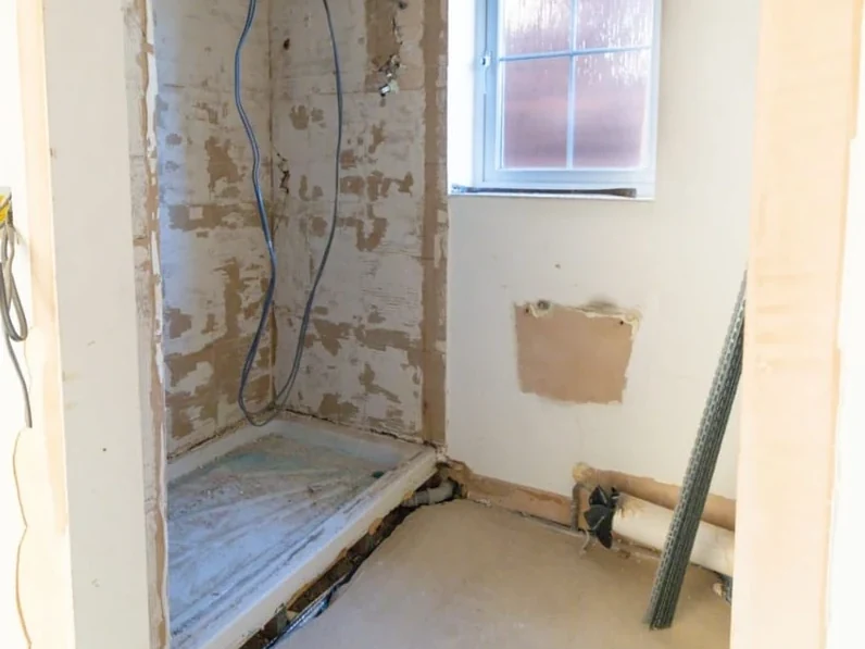 Coventry room stripped back to bare wall before filling and priming
