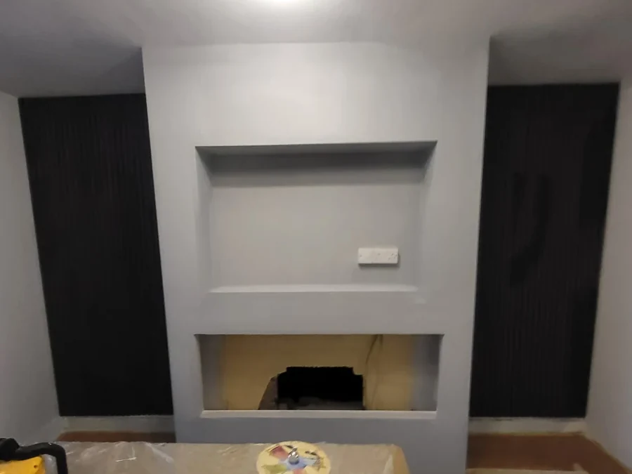 Restored fireplace recess in a Coventry period property