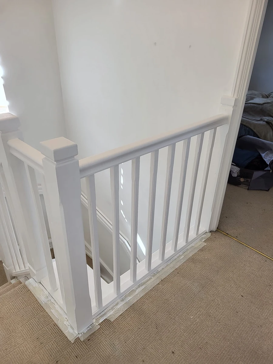 Staircase prepared for a durable repaint in a Coventry rental